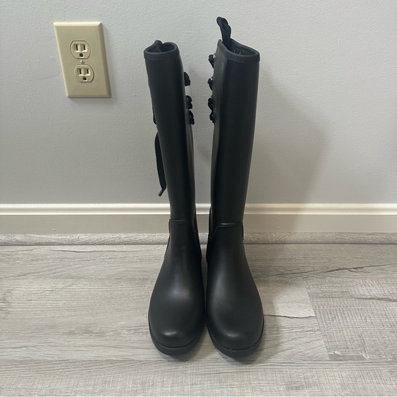 Woman’s Coach Tristee Black Lace Up Rain Boots - Picture 1 of 15